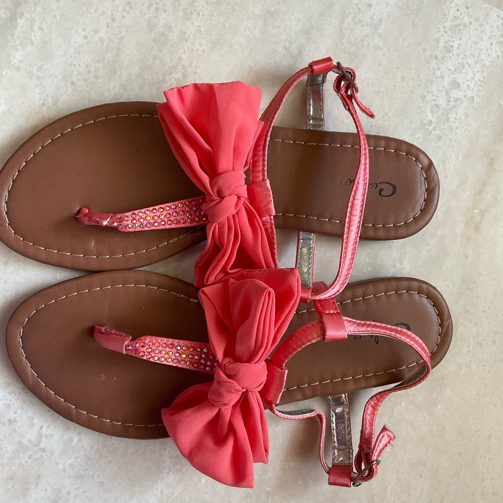 C. Wonder Pink and Brown Sandals with Bow Accents